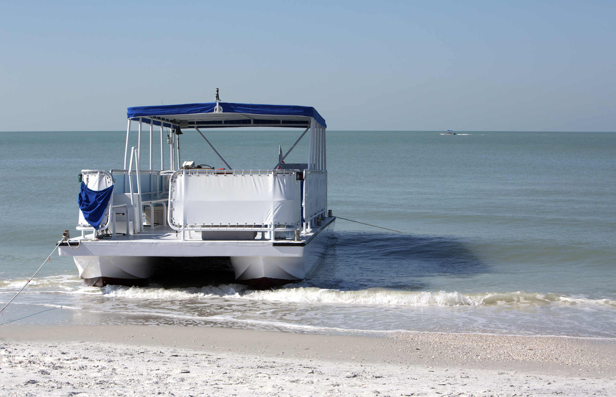 Pontoon Boat on beach